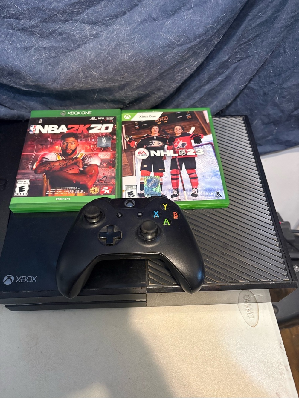 Microsoft Xbox One Console with Black Wireless Controller and Green Game Cases